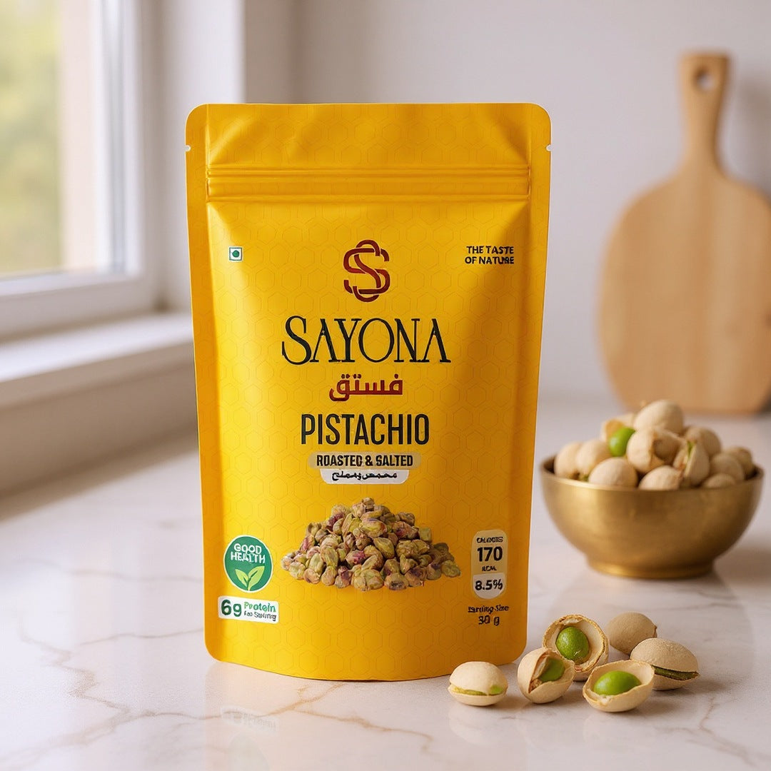 Sayona roasted pistachios on a marble counter